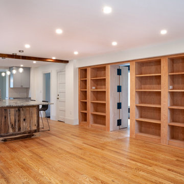 Custom record storage shelving with hidden door