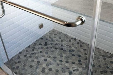 Large country white tile bathroom photo in Boston with marble countertops