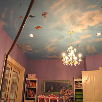 Sky Ceiling Mural with Butterflies, hand-painted in a bedroom by Mural Art LLC.