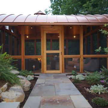 Path lights, boulders and landscaping flank the entryway