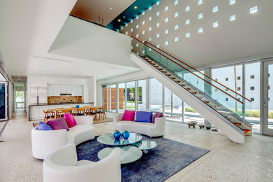 Living room - contemporary living room idea in Tampa with white walls