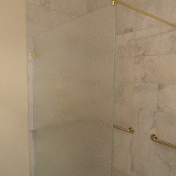 Custom Glass Spray Panels, Splash Guards, and Fixed Panel Shower Units