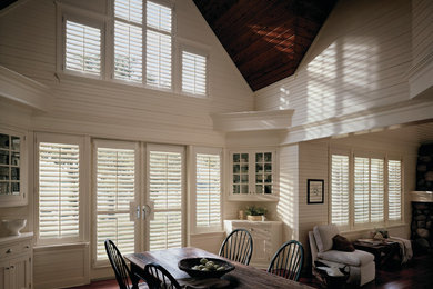 Great room - mid-sized farmhouse dark wood floor and brown floor great room idea in Atlanta with white walls and no fireplace