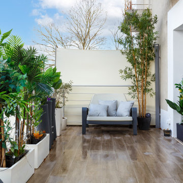 Équilibre Contemporain : Une Maison Réinventée sur Trois Niveaux