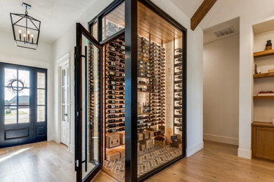 Wine cellar - french country wine cellar idea in Dallas