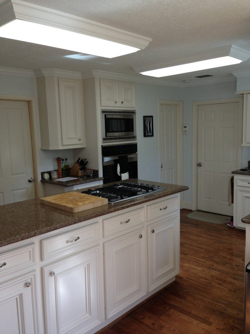 Kitchen lighting help needed what can I replace the fluorescent strips with? Kitchen lighting help needed what can I replace the fluorescent strips with?