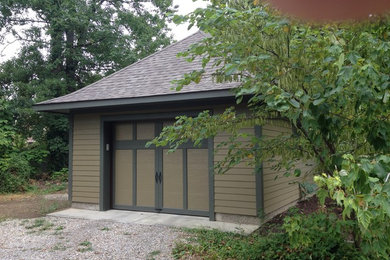 Inspiration for a mid-sized timeless detached one-car garage remodel in Indianapolis