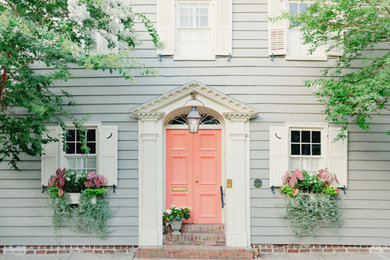 Large elegant home design photo in Charleston