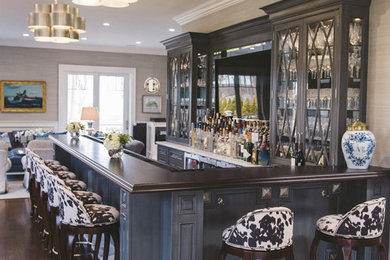 Inspiration for a traditional home bar in New York.