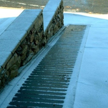 Bruce walks up and down his slippery driveway with ease