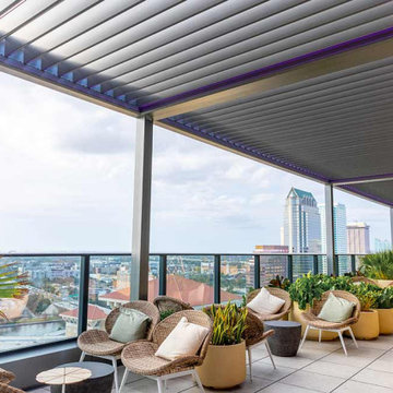 Rooftop Bar with A Custom Motorized Louvered Pergola.