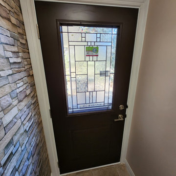 Elegant black entry door_$2,700 - $2,800