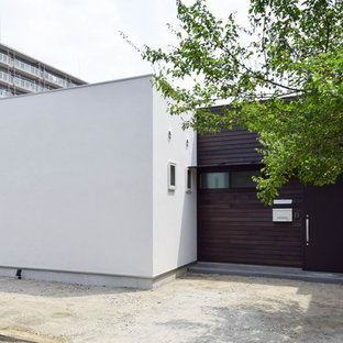 他の地域のモダンスタイルのおしゃれな家の外観 (陸屋根、混合材サイディング、戸建) の写真