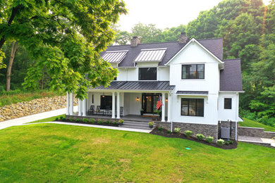 Example of a transitional exterior home design in Columbus