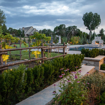 Fenced Garden With Exterior Lighting