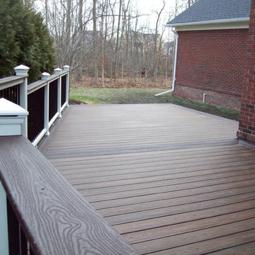 TREX TRANSCENDS SPICED RUM WITH VINTAGE LANTERN BORDER & WHITE TREX RAILING