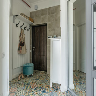 Inspiration for a small eclectic front door in Other with white walls, ceramic floors, a single front door, a brown front door and multi-coloured floor.