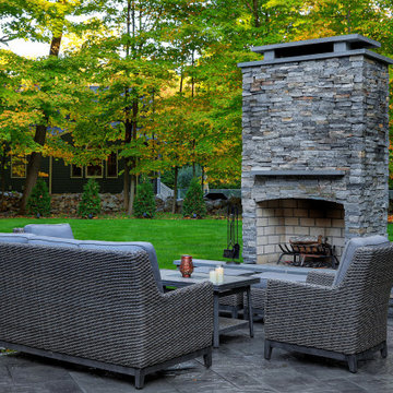 Make a Statement with a Versatile Outdoor Kitchen and Double Fire Feature