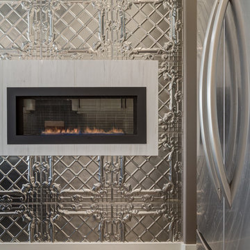 Sensuous kitchen details: fireplace, pressed tin