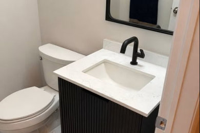 Powder room - mediterranean powder room idea in Toronto