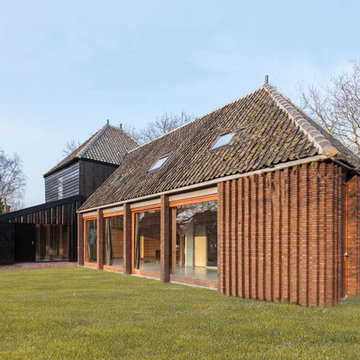 BARN HOUSE, restoration of a rural complex in Watergang