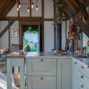 Country Style Sage Green Shaker Kitchen with Colonial White Granite Tops