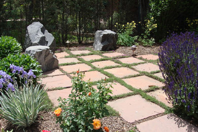 Design ideas for a mid-sized contemporary full sun backyard outdoor basketball/tennis/multi-game court in Denver.
