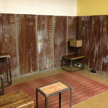 Rusty tin barn roofing and reclaimed barn wood tables
