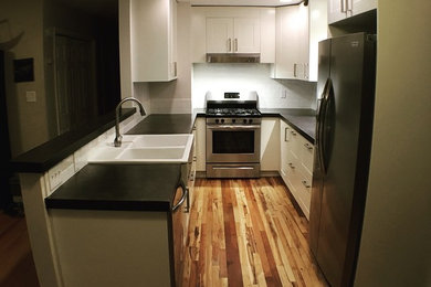 Kitchen - contemporary kitchen idea in Other