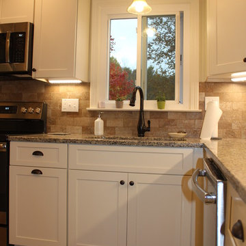 Color coordination of granite backsplash and faucet