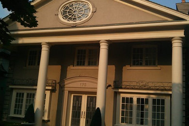 Example of an exterior home design in Toronto