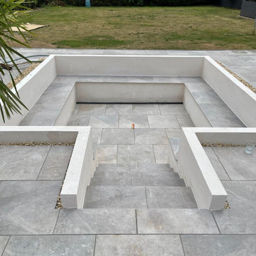Steps Down Into a Sunken Porcelain Seating Area