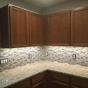 Kitchen Backsplash - Linear Mosaic and Glass with Santa Cecilia Granite Counter