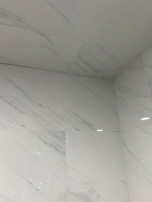 New steam shower holes in grout