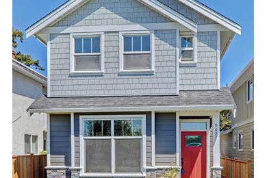 Mid-sized craftsman gray two-story mixed siding exterior home idea in Vancouver
