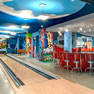 Imagen de sótano en el subsuelo actual, sin chimenea, con paredes azules y suelo de cemento