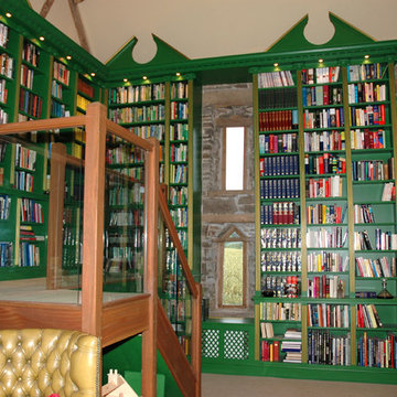 Gilded and painted library over several rooms in a converted 11th century barn