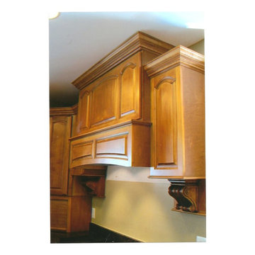 Custom Built Stove Hood and additional doors and moldings to Kitchen