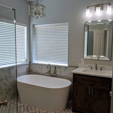 Marble and espresso bathroom