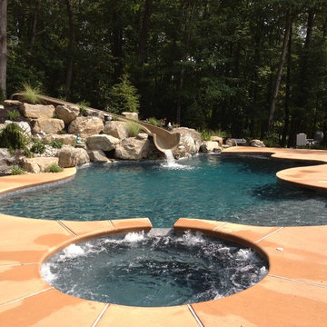 Stroud Township salt water pool with spa, sunshelf, slide, and waterfall