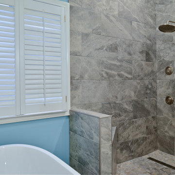Elegant Curved Shower Highlights New Spacious Master Bath