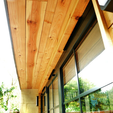 Timber Clad Soffit and Crittall Style Bi-fold Doors