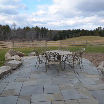 Stone patio overlooking rolling fields