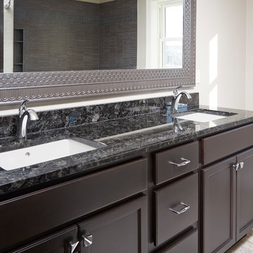 Asian-Inspired designed bathroom with Granite countertops