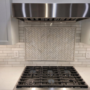 Backsplash tile accent box herringbone