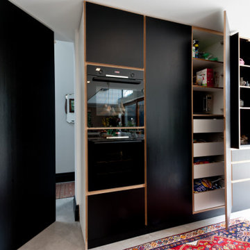 Black and wood vibrant contemporary kitchen