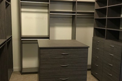 Inspiration for a timeless closet remodel in San Diego