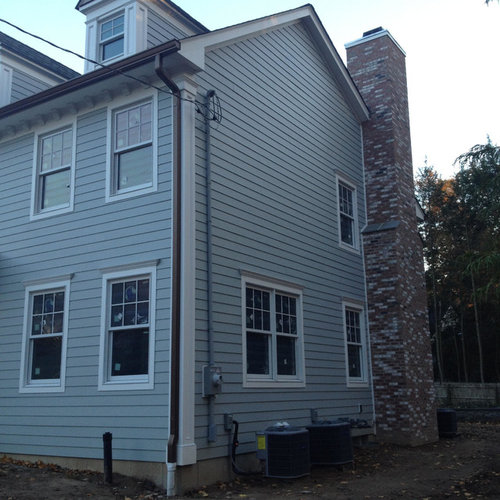 Are the downspouts installed in the most visually appealing way?