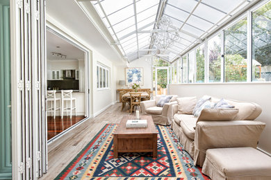 Photo of an expansive contemporary sunroom in Perth with ceramic floors.