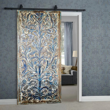 Incorporating Antique Carved Barn Doors into a Spanish-Style Farmhouse